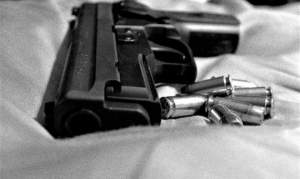 Șoc în Caracal: un polițist s-a împușcat în cap cu arma din dotare