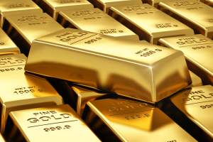 Cotația aurului a atins un nou maxim istoric de 2.200 de dolari uncia
