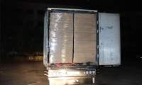 Un bărbat care transporta cu un TIR 600.000 de pachete cu țigări de contrabandă, reținut de procurorii DIICOT Iași (VIDEO)