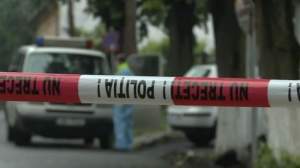 Bărbat împușcat de un tânăr în parcarea unui bloc din Craiova