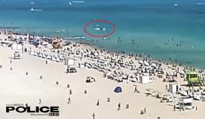 Momentul în care un elicopter se prăbușește în apă, printre oamenii care înotau, în Miami (VIDEO)