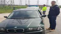 BMW cu numere false de înmatriculare, depistat în trafic pe Drumul Hoților
