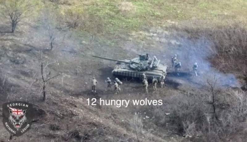 „12 lupi flămânzi”: Atac model al unui pluton din Legiunea Georgiană, sprijiniți de un tanc, contra unei poziții rusești (VIDEO)