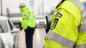 Polițist, adjectiv. Agent de la Rutiera din Giurgiu, păcălit de colegi să ceară șefilor un porc de Crăciun de 160 de kg